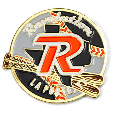 Circular trading pin with a red 'R' and the words 'Revolution La Porte'.