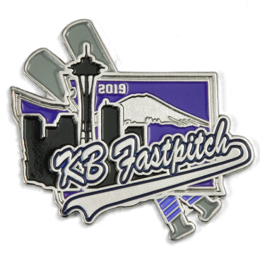 KB Fastpitch trading pin with city skyline, bats, and 2019 label.