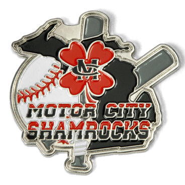 Trading pin with 'Motor City Shamrocks' text, a red clover, and baseball design.