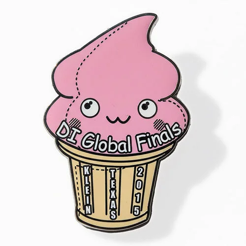 Custom trading pin shaped like a kawaii-style pink ice cream cone with a smiling face, featuring the text “DI Global Finals” across the scoop. The cone has vertical lettering that reads “Klein Texas 2015,” representing a team from Klein, Texas at the 2015 Destination Imagination Global Finals.